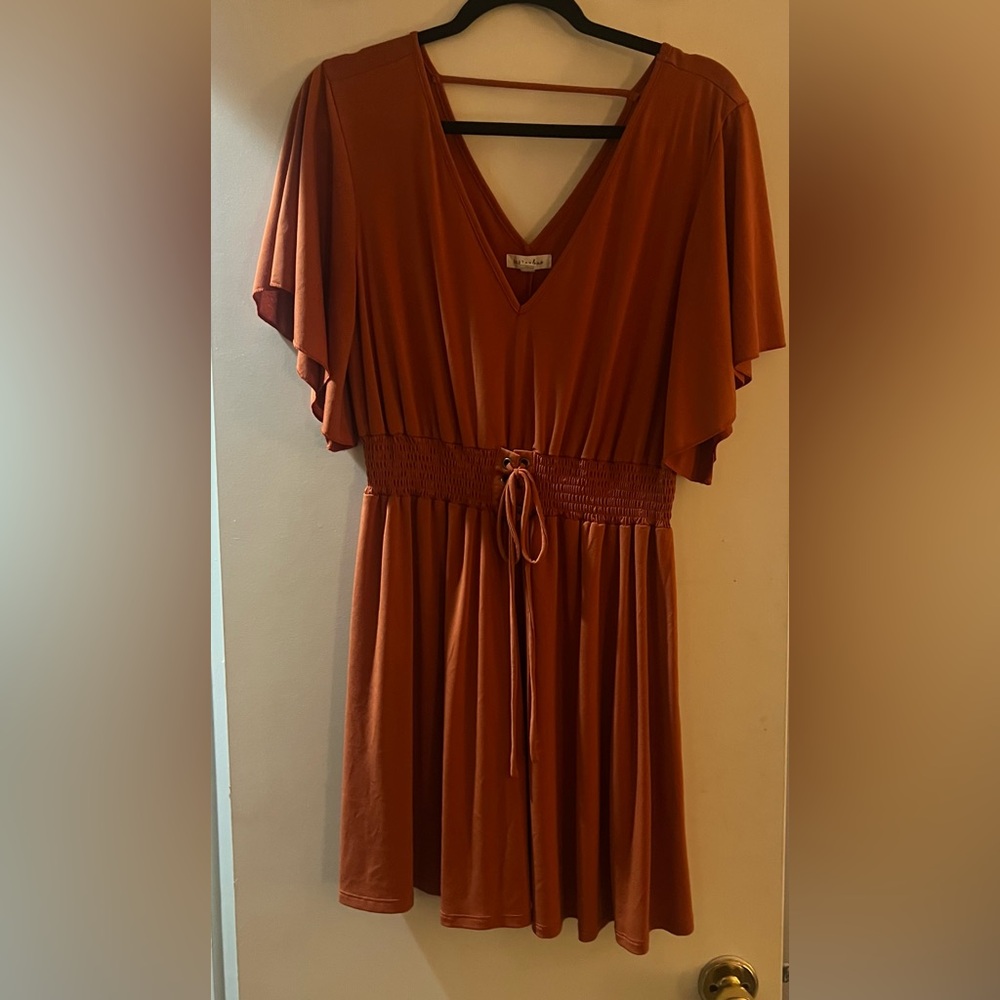 Elegant Rust Dress with Flutter Sleeves